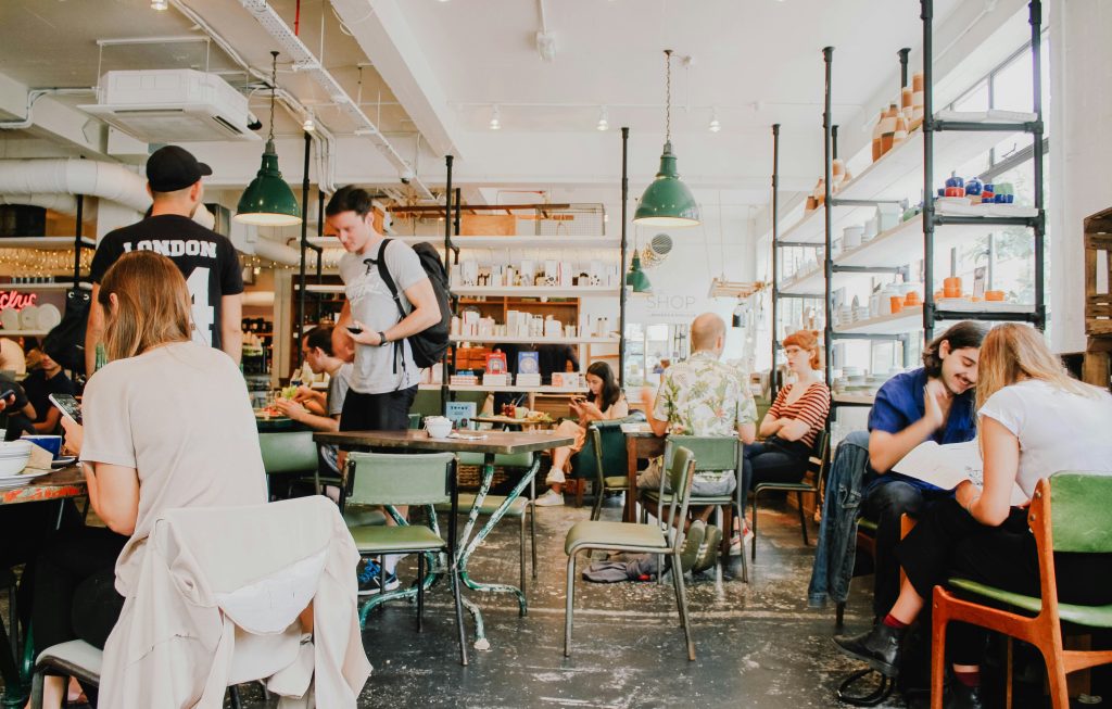 A restaurant with people in it